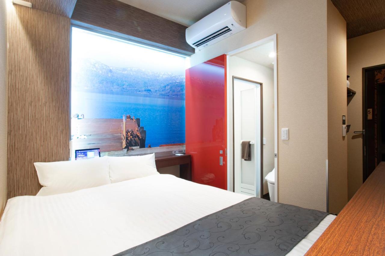 Hotel Xcell Hiroshima Nagarekawa Экстерьер фото